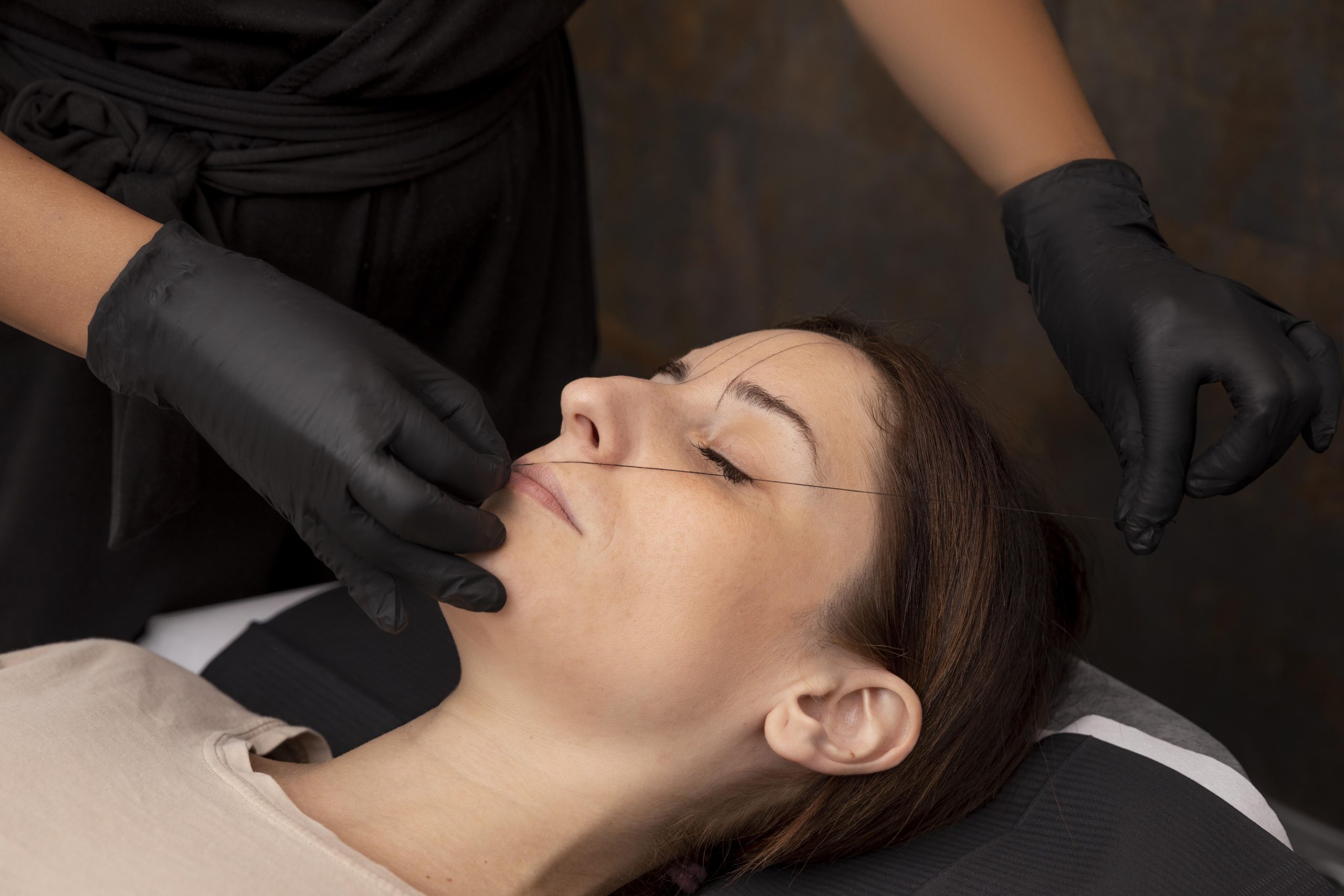 woman-going-through-microblading-procedure-1-scaled.jpg